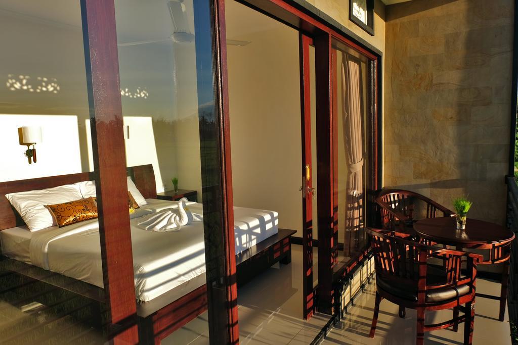 Putra Guest House Убуд Экстерьер фото